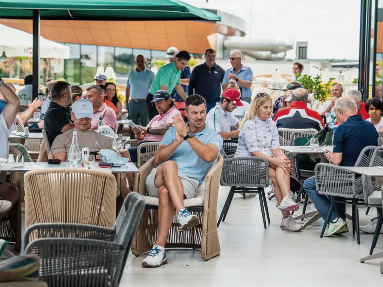 Guests enjoying hospitality at an international golf event